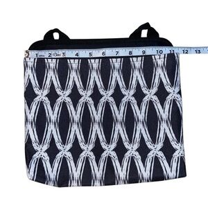 Like New - Thirty One oh snap wall pouch in black and white - great condition!
